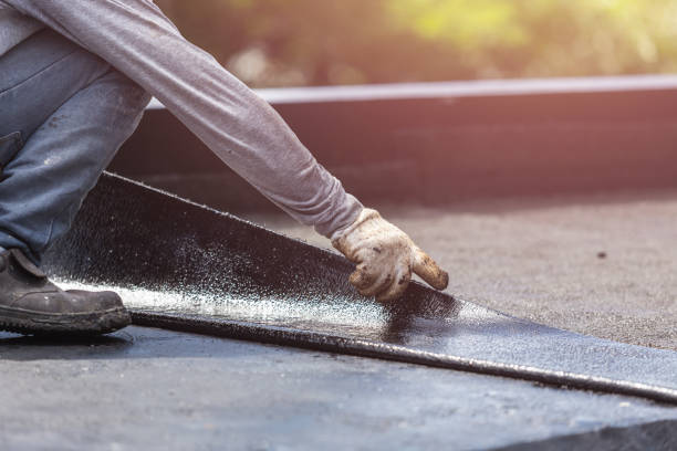 Professional Basement Waterproofing technician working in New Milford, NJ